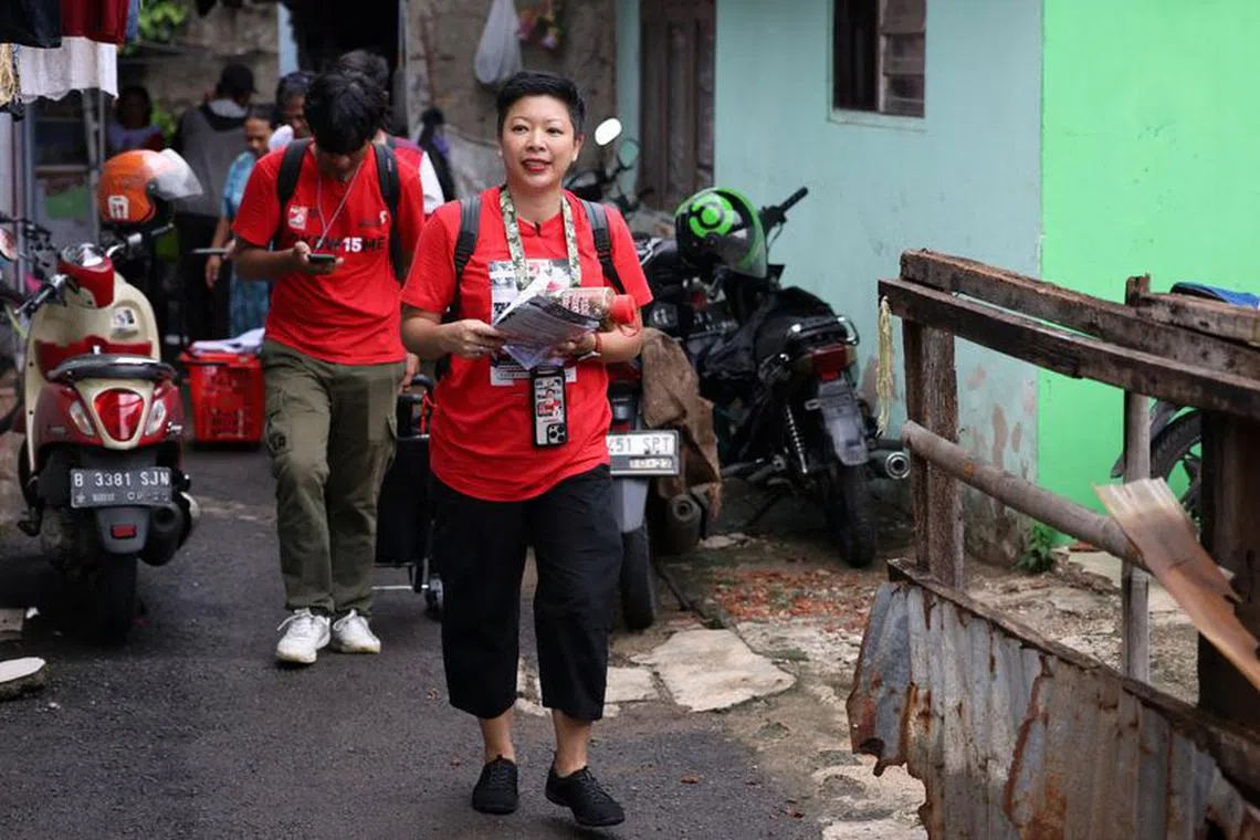 Francine Widjojo, 44, a parliamentary candidate from the Indonesian Solidarity Party (PSI) walks during her campaign in Jakarta, Indonesia, January 28, 2024. REUTERS/Ajeng Dinar Ulfiana