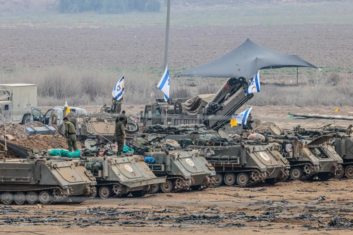 Israeli soldiers preparing for ground manoeuvres near the border with Gaza on Oct 29.