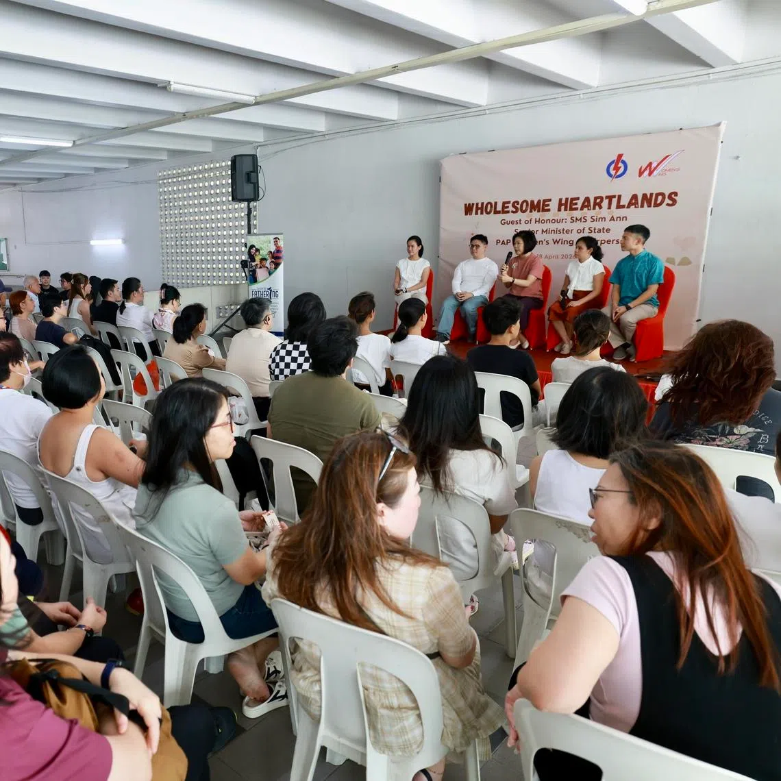(On stage, from left) Mrs Bernadette Giam, Mr Foo Cexiang, Ms Sim Ann, Ms Elysa Chen, and Mr Shawn Loh speaking to participants of the community dialogue session on April 18.