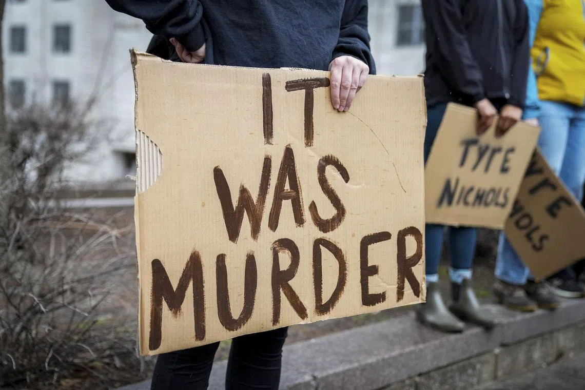 Protesters gather in front of the Donnelley J. Hill Public Safety building in Memphi on Jan 28, 2023, one day after the city of Memphis released video of several police officers beating Tyre Nichols. 