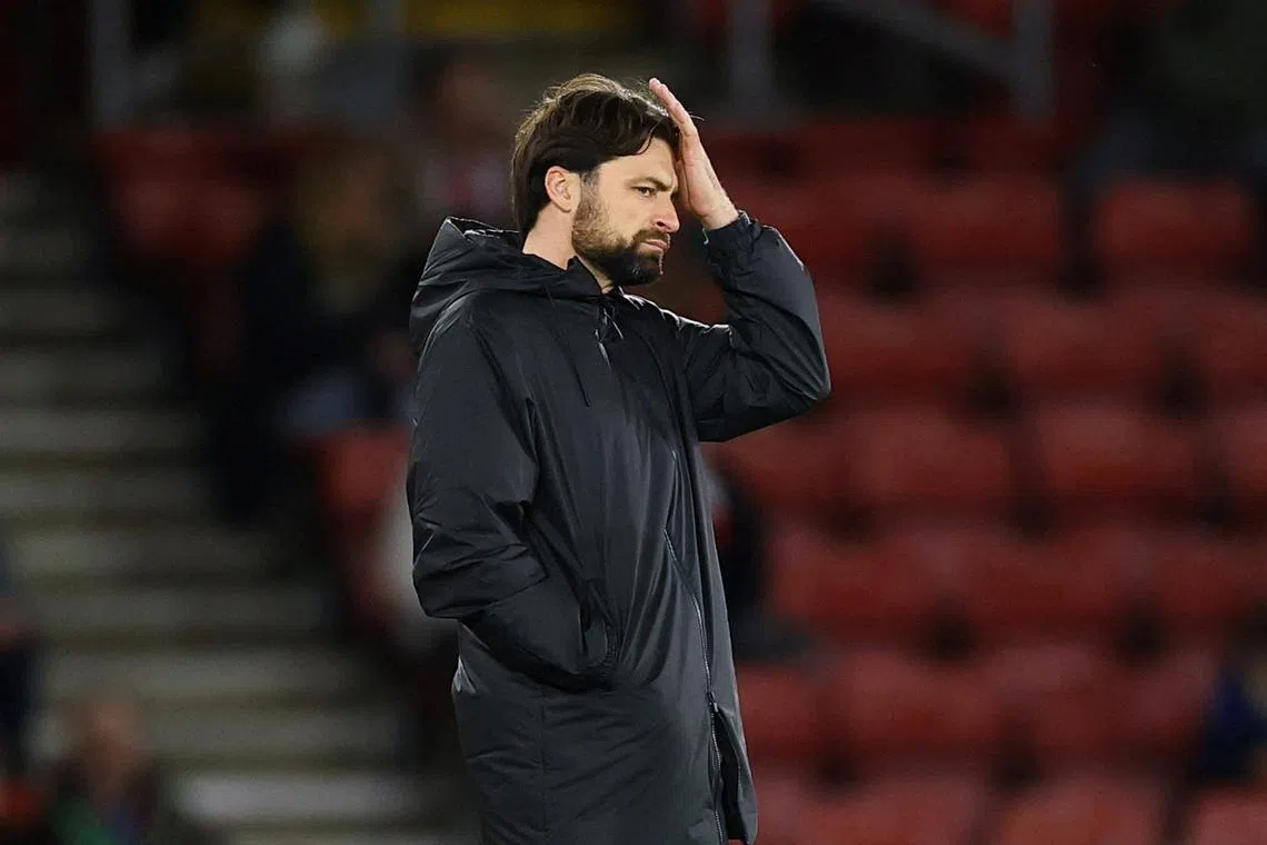 Southampton manager Russell Martin reacts during the match against Tottenham.  