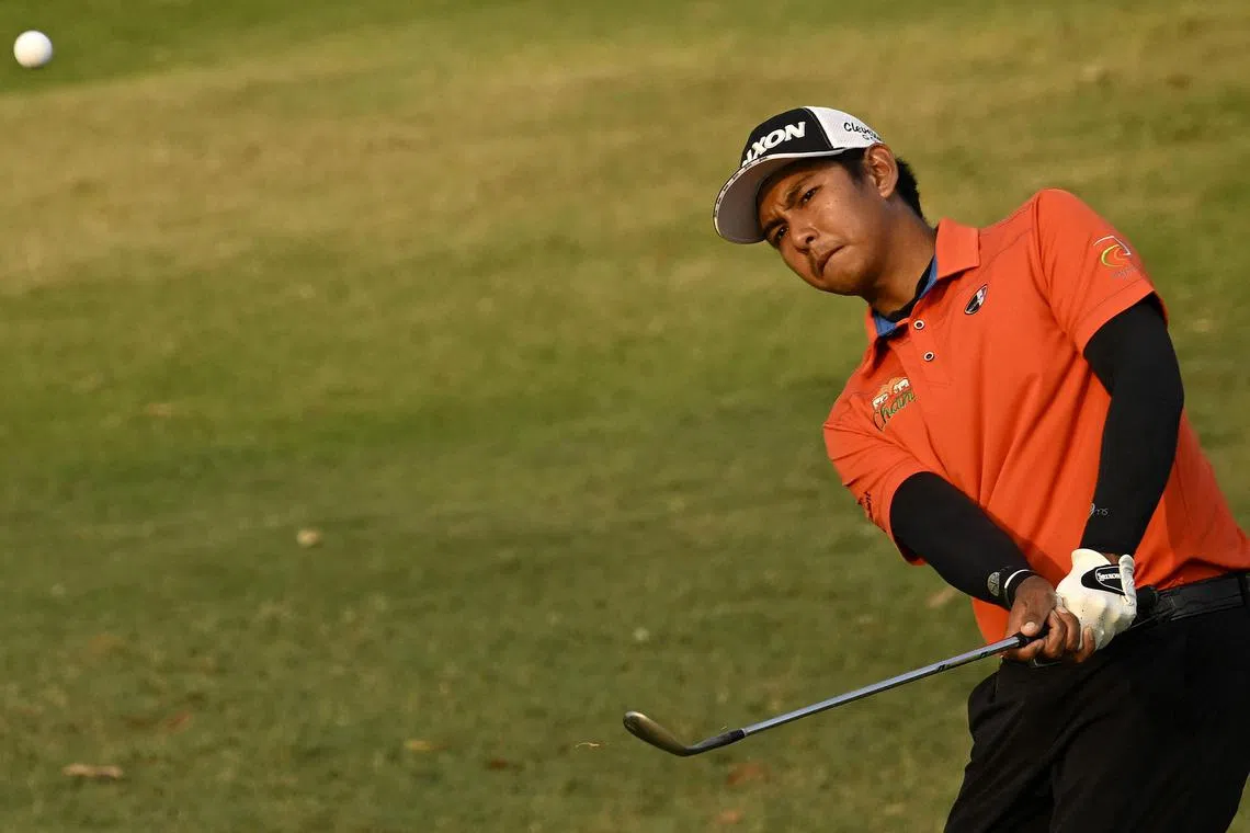 This handout photo taken and released on March 9, 2023 by the Asian Tour shows Nitithorn Thippong of Thailand hitting a shot during the first round of the International Series Thailand at Black Mountain Golf Club in Hua Hin. (Photo by Paul LAKATOS / Asian Tour / AFP) / RESTRICTED TO EDITORIAL USE - MANDATORY CREDIT "AFP PHOTO / ASIAN TOUR / PAUL LAKATOS - NO MARKETING NO ADVERTISING CAMPAIGNS - DISTRIBUTED AS A SERVICE TO CLIENTS - NO ARCHIVE