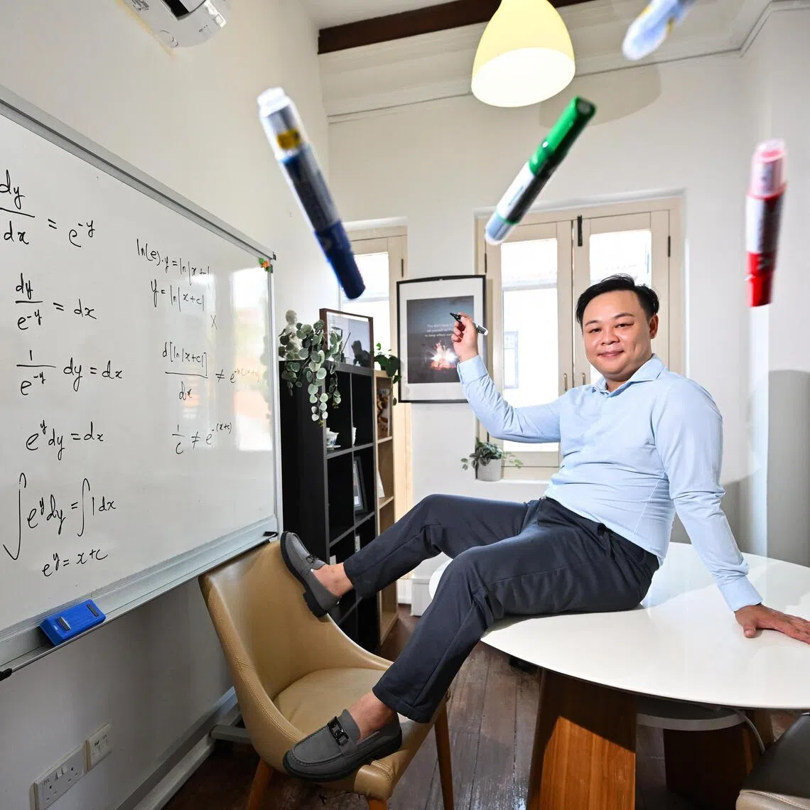 ST20250724-202540400907-Lim Yaohui-Sue-Ann Tan-samoney/
Mr Gary Ong, 35, founder of Genius Mind Home Tuition, inside a co-working space for his office in Pagoda Street on July 24, 2025.
For Me and My Money.
(ST PHOTO: LIM YAOHUI)