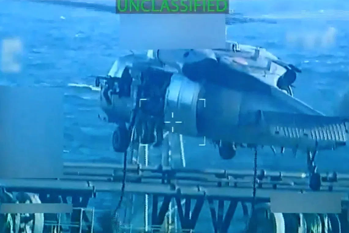 U.S. forces abseil onto an oil tanker during a raid described by U.S. Attorney General Pam Bondi as its seizure by the United States off the coast of Venezuela, December 10, 2025, in a still image from video.  U.S. Attorney General/Handout via REUTERS