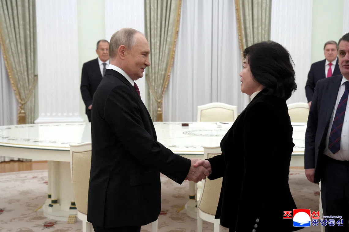 Russian President Vladimir Putin and North Korean Foreign Minister Choe Son Hui shake hands as they meet in Moscow, Russia, in this image obtained by Reuters on October 27, 2025. KCNA/Slava Prokofev via REUTERS