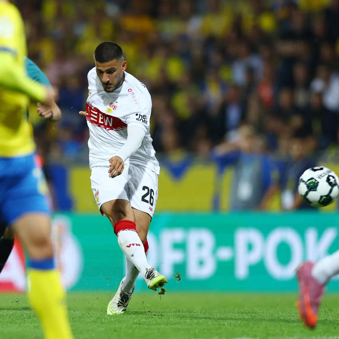 Soccer Football - DFB Cup - First Round - Eintracht Braunschweig v VfB Stuttgart - Eintracht-Stadion, Braunschweig, Germany - August 26, 2025 VfB Stuttgart's Deniz Undav shoots at goal REUTERS/Lisi Niesner