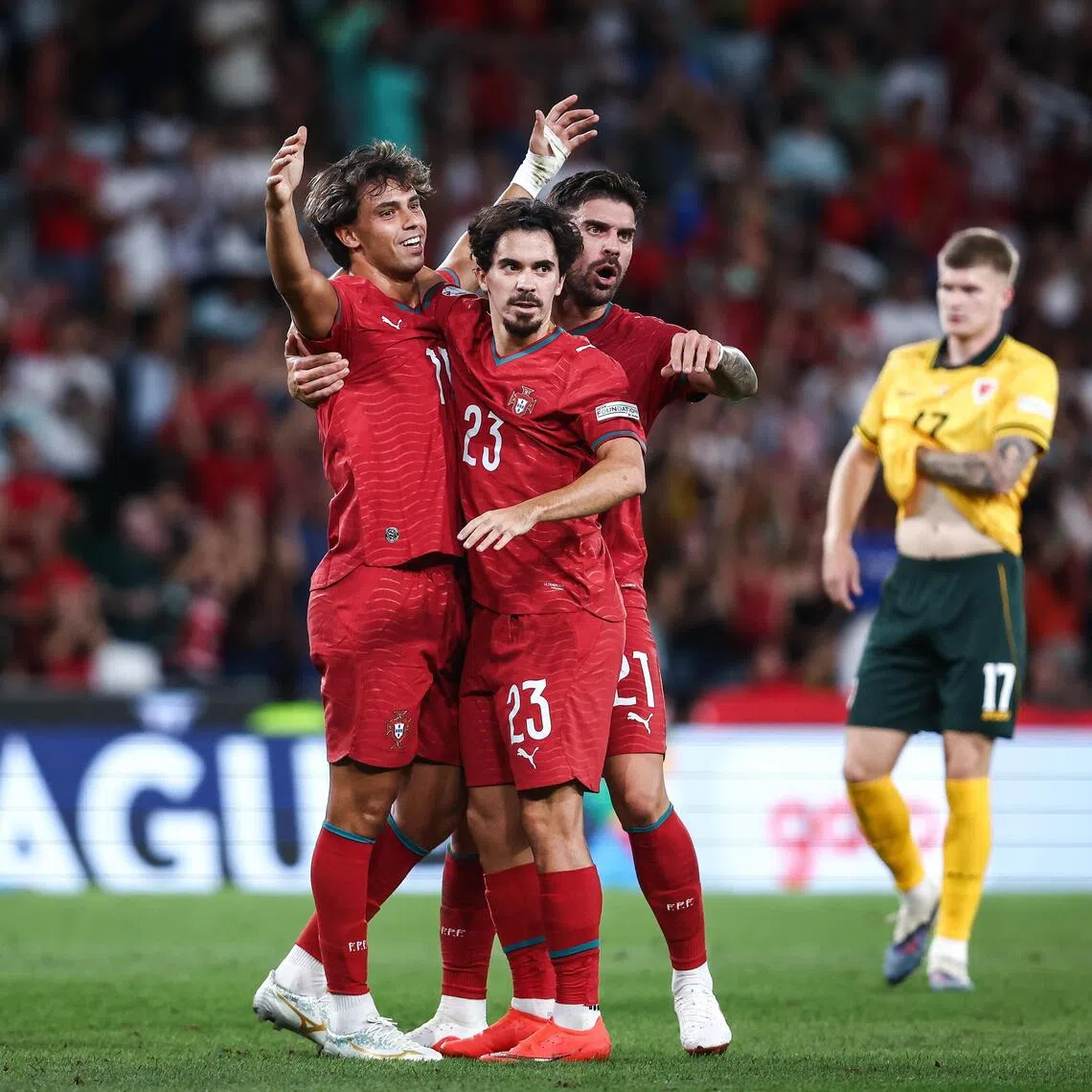 Joao Felix (second from left) celebrating with teammates after scoring for Portugal in their Sept 24 match against Wales in Lisbon.