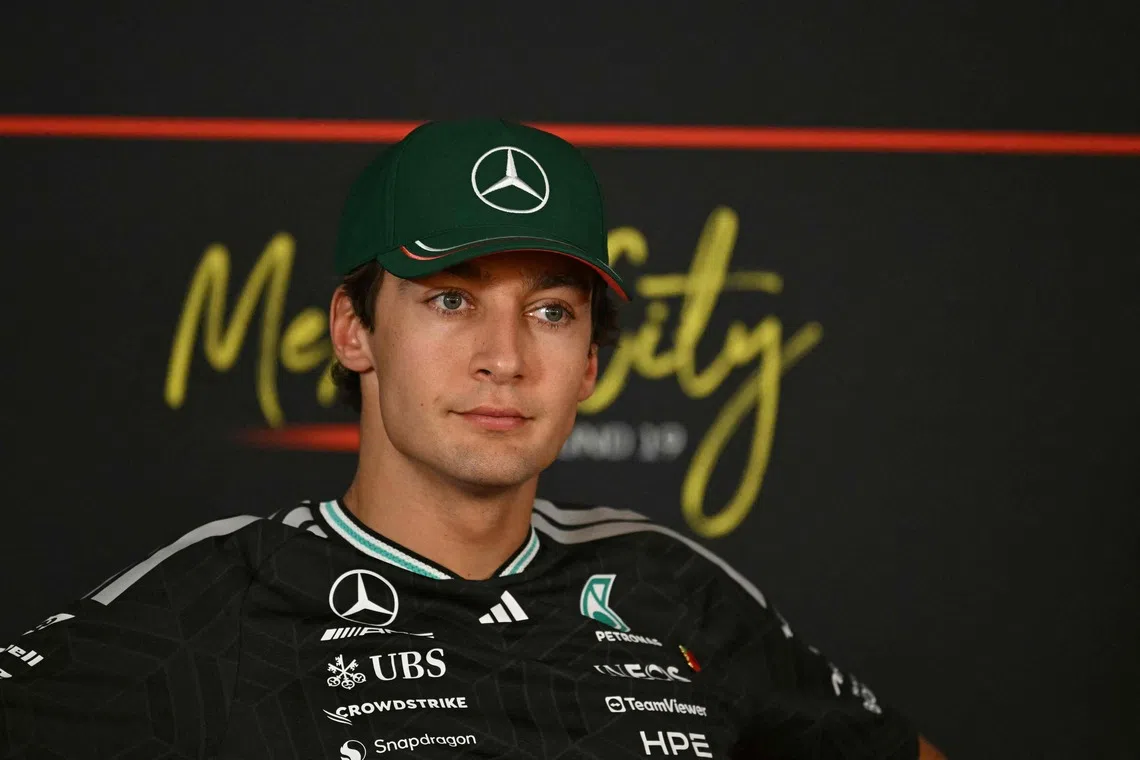 Mercedes' British F1 driver George Russell gestures during the official Formula One Press conference at the Hermanos Rodriguez racetrack in Mexico City on Oct 29.