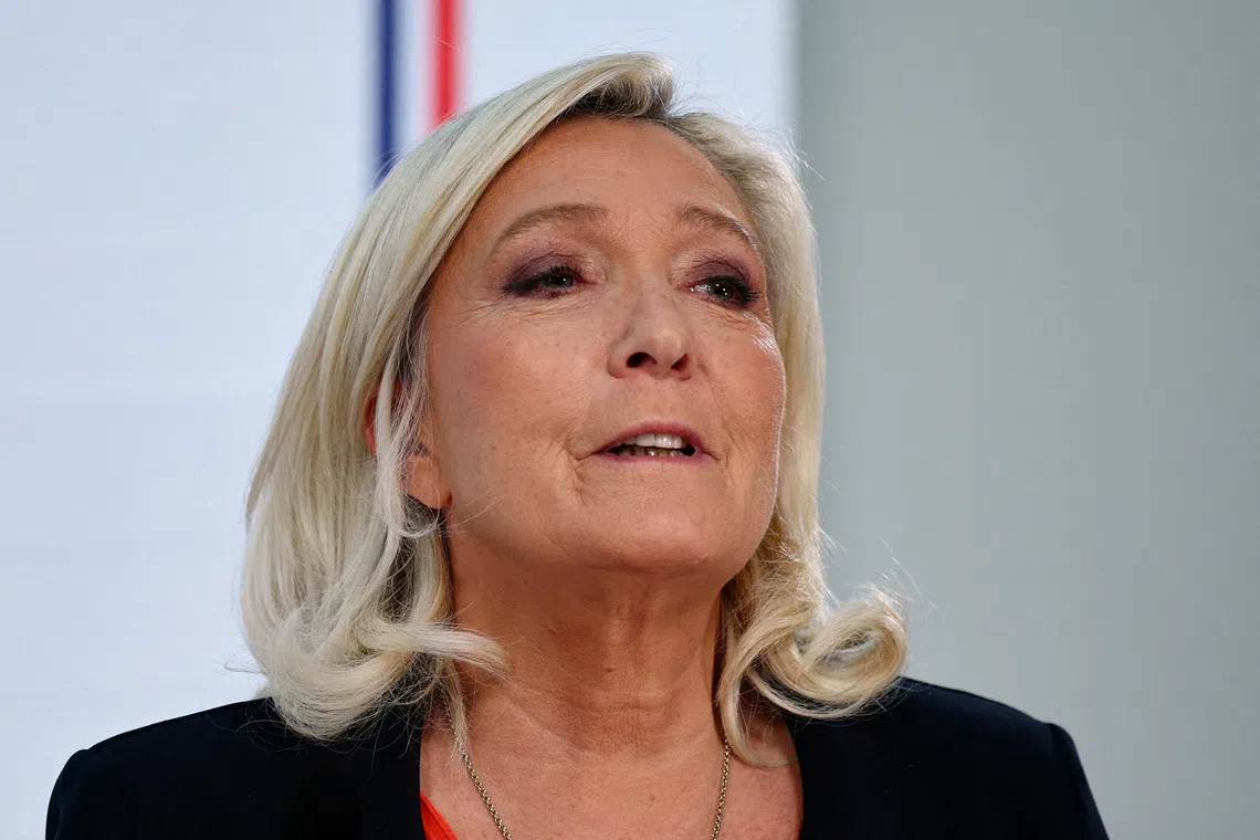 FILE PHOTO: French far-right leader Marine Le Pen, member of parliament for the French far-right Rassemblement National (National Rally - RN) party and candidate for the 2027 French presidential election, speaks during a press conference to present the party's alternative budget for 2027 and its fiscal strategy, in Paris, France, October 6, 2026. REUTERS/Sarah Meyssonnier/File Photo