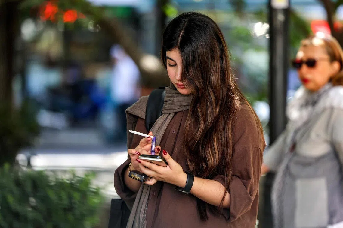 Iran arrests two marathon organisers over images of women competing without hijab