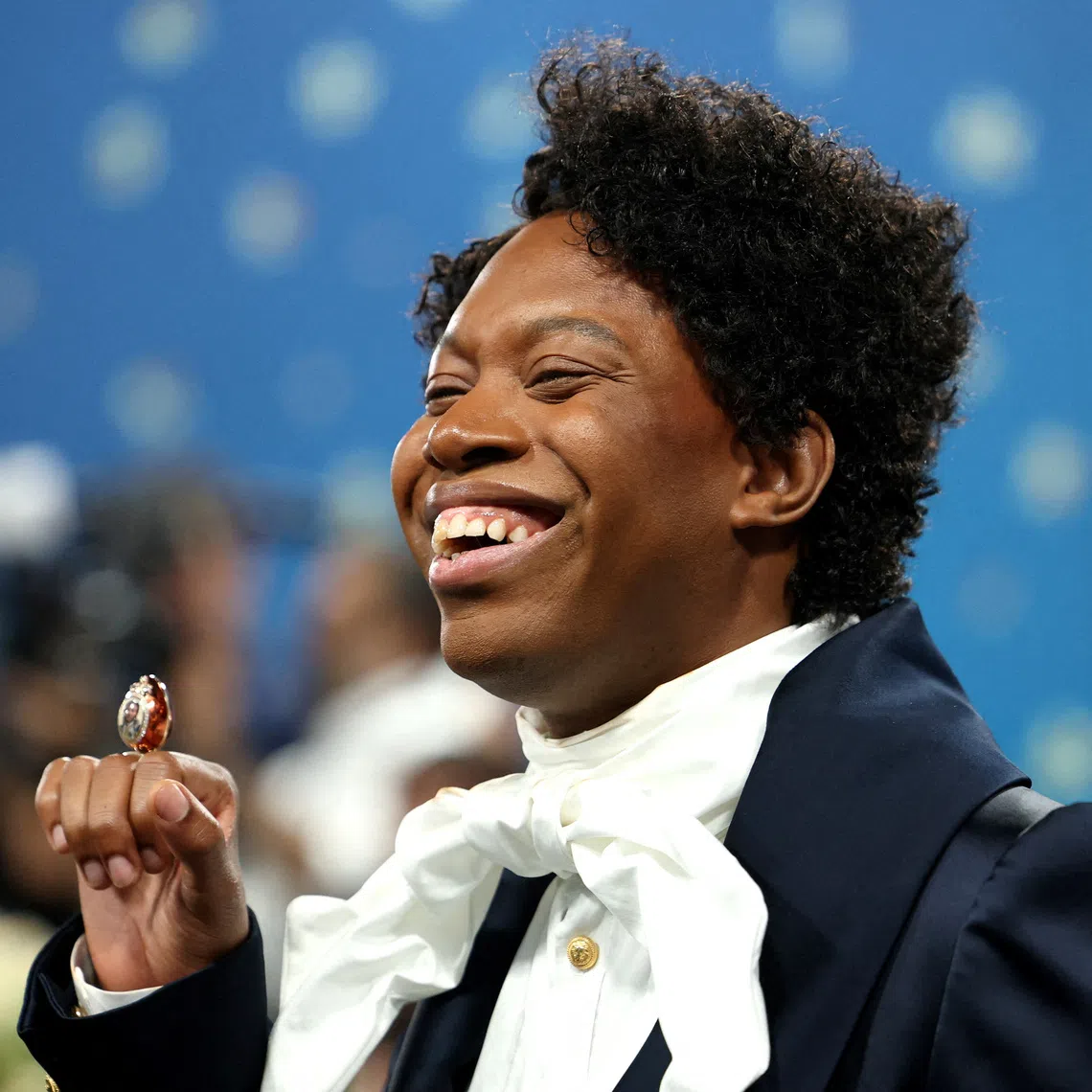 FILE PHOTO: Jeremy O. Harris poses during the Met Gala, an annual fundraising gala held for the benefit of the Metropolitan Museum of Art's Costume Institute with this year's theme 'Superfine: Tailoring Black Style,' in New York City, New York, U.S., May 5, 2025. REUTERS/Mario Anzuoni/File Photo
