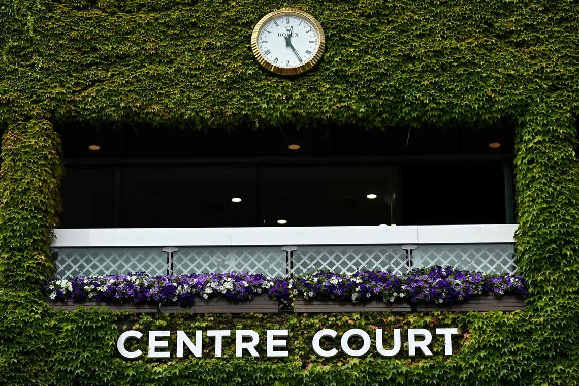 A photograph taken on June 24, 2025 shows window boxes placed on Centre Court entirely covered in Ivy at the All England Lawn Tennis & Croquet Club in Wimbledon, south west London. Wimbledon head gardener Martyn Falconer is the only man at the All England Club who welcomes a spot of rain during Wimbledon tennis tournament to help keep his flowers in tip-top shape. He oversees the delivery of 27,000 plants specifically for the Championships in leafy southwest London to add to thousands already in place in the immaculate grounds. (Photo by GLYN KIRK / AFP)