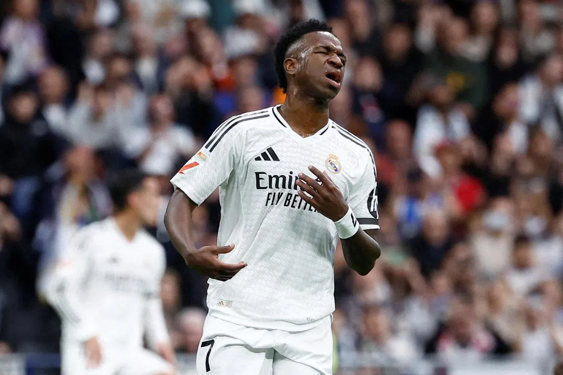 Real Madrid's Vinicius Jr reacts after missing a penalty kick against Valencia on April 5.