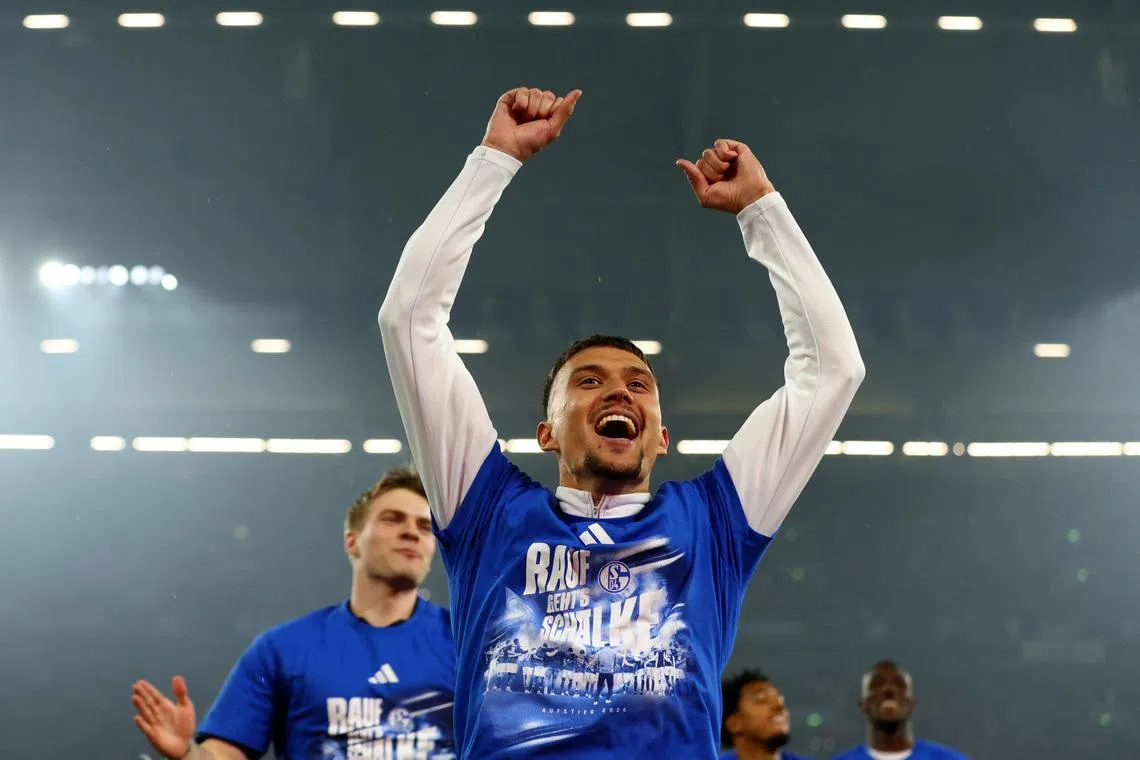 FILE PHOTO: Soccer Football - 2. Bundesliga - Schalke 04 v Fortuna Dusseldorf - Veltins-Arena, Gelsenkirchen, Germany - May 2, 2026 Schalke 04's Dejan Ljubicic celebrates after winning promotion to the Bundesliga REUTERS/Thilo Schmuelgen/File Photo