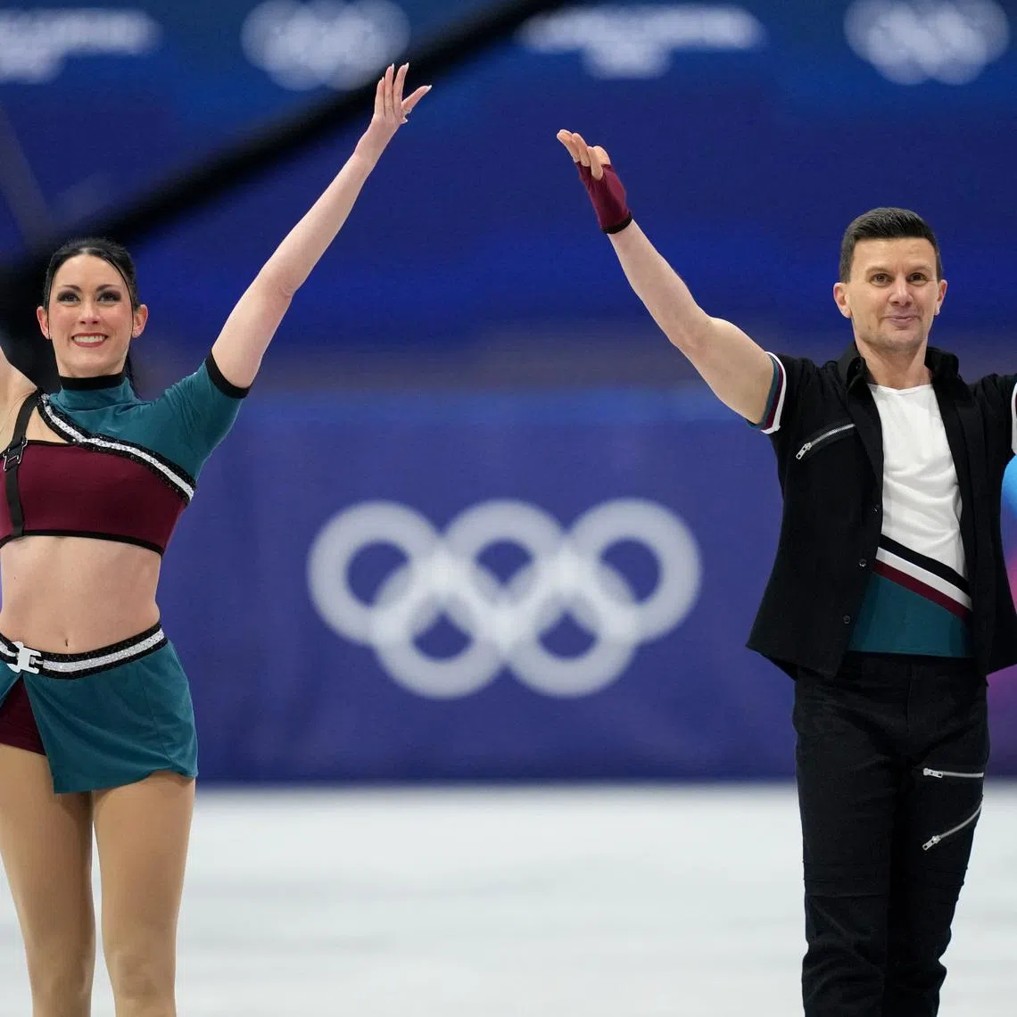 Feb 9, 2026; Milan, Italy; Charlene Guignard and Marco Fabbri of Italy react after skating during ice dancing at the Milano Cortina 2026 Olympic Winter Games at Milano Ice Skating Arena. Mandatory Credit: James Lang-Imagn Images
