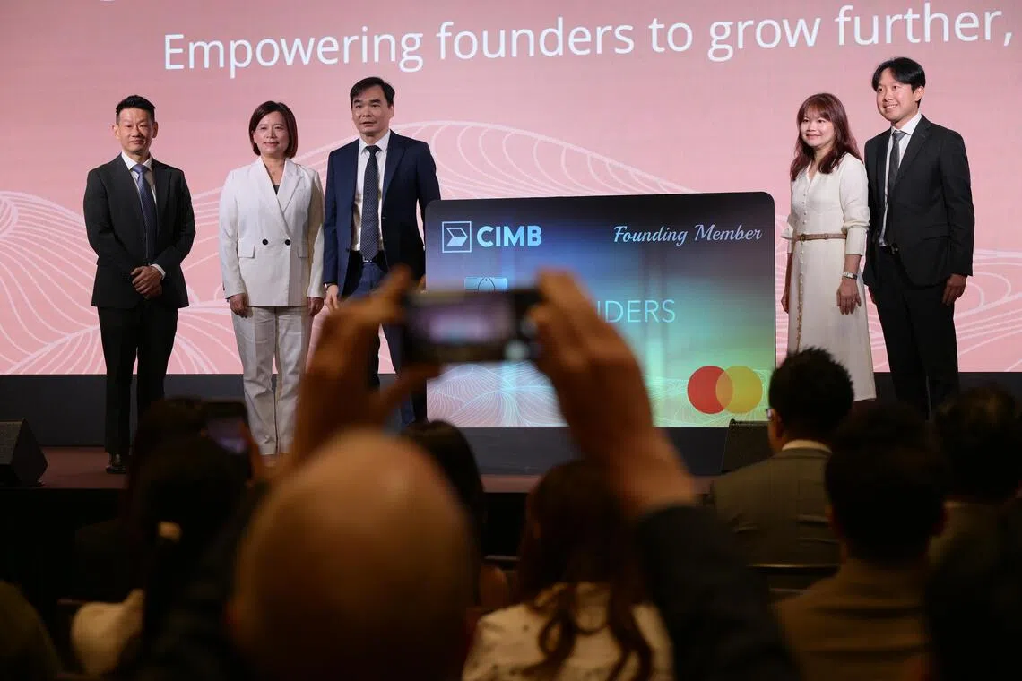 sccimb16/ST20250916_202588000799/Ng Sor Luan/CIMB Founders Card launch for SMEs on Sept 16, 2025 at Hilton Hotel. // (L to R) Benjamin Tan (Head of Commercial and Transaction Banking, CIMB Singapore), Merlyn Tsai (Head of Consumer Banking and Digital, CIMB Singapore), Andrew Boey (Chief Financial Officer and Officer-in-Charge, CIMB Singapore), Quek Puay Cheng (Head of Financial Institutions, Singapore, Mastercard) and Jaden Tok (Commercial Cards Lead, Singapore, Mastercard) at the launch.