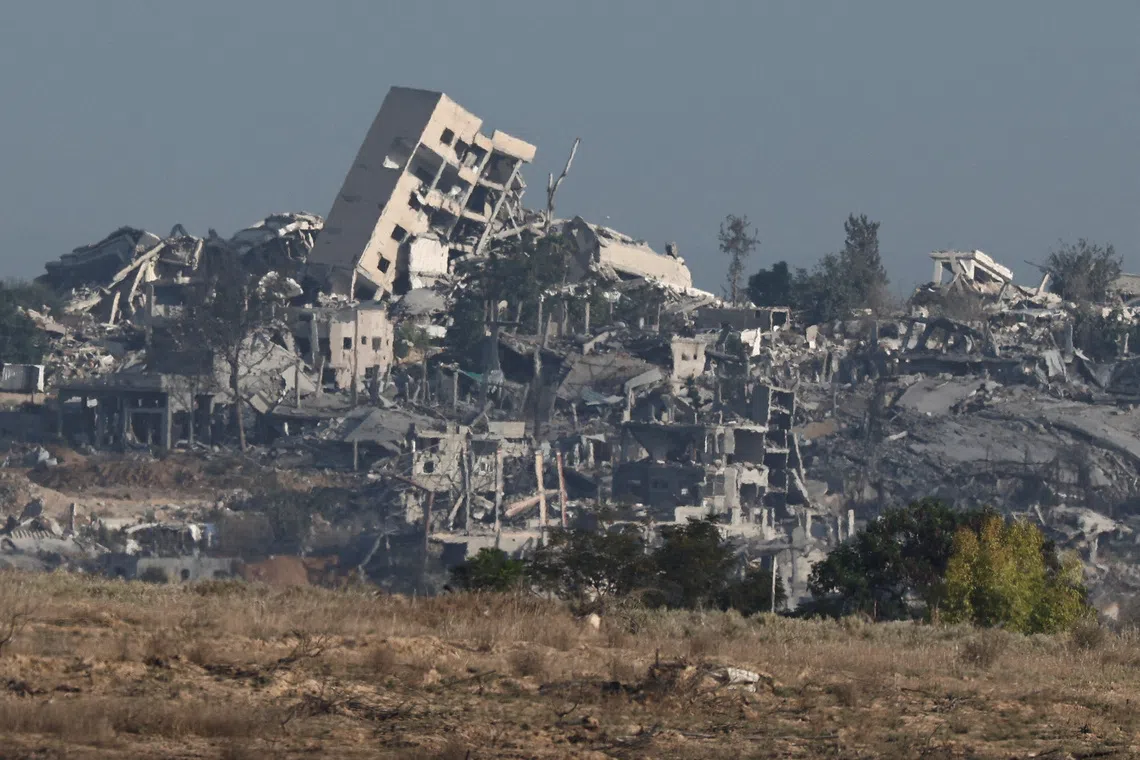 Destroyed buildings in Gaza, as seen from Israeli side of the Israel-Gaza border, in Israel, September 21, 2025. REUTERS/Amir Cohen