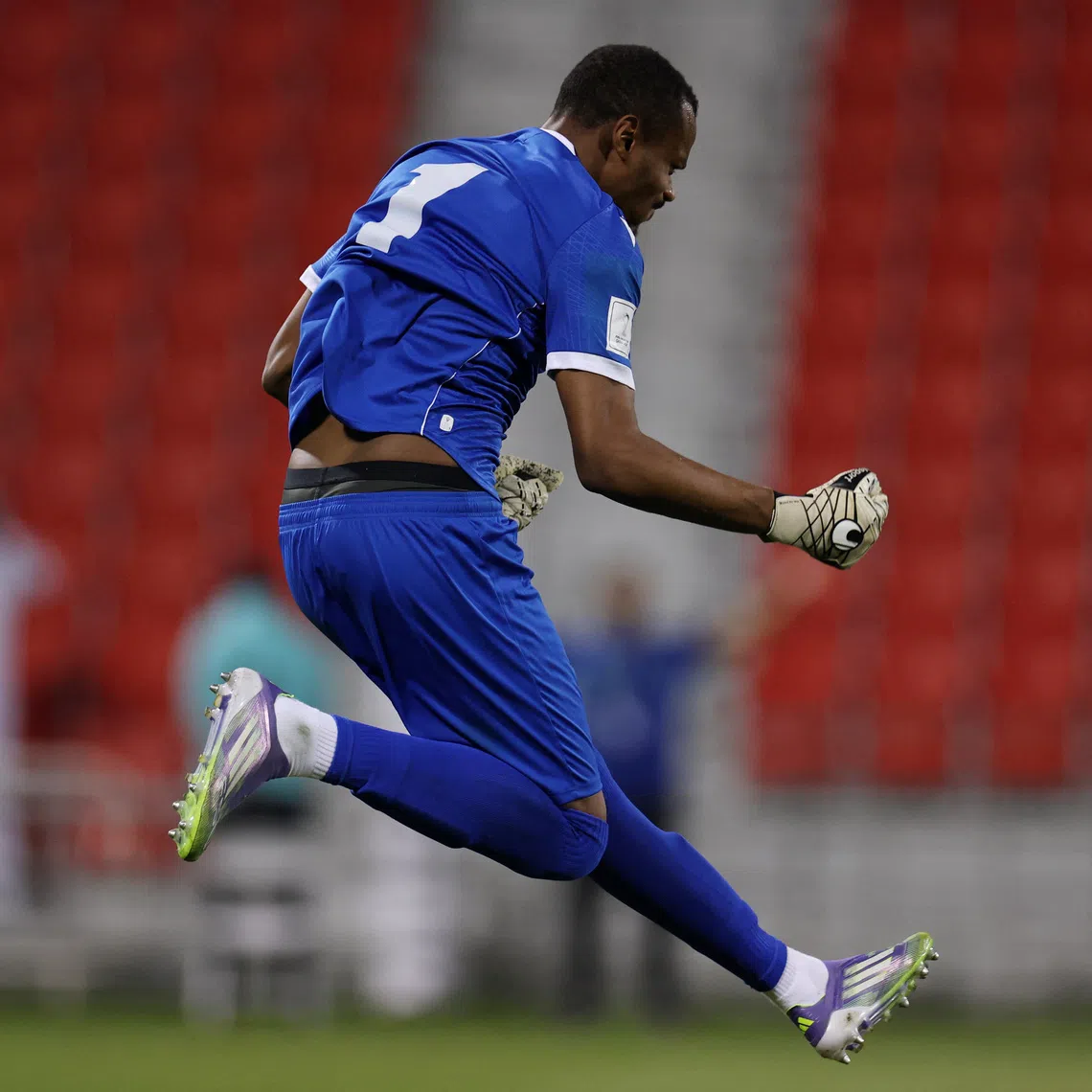Soccer Football - FIFA Arab Cup - Qatar 2025 - Qualifying - Comoros v Yemen - Grand Hamad Stadium, Doha, Qatar - November 26, 2025 Comoros' Adel Anzimati celebrates after saving a penalty during the penalty shootout REUTERS/Thaier Al-Sudani