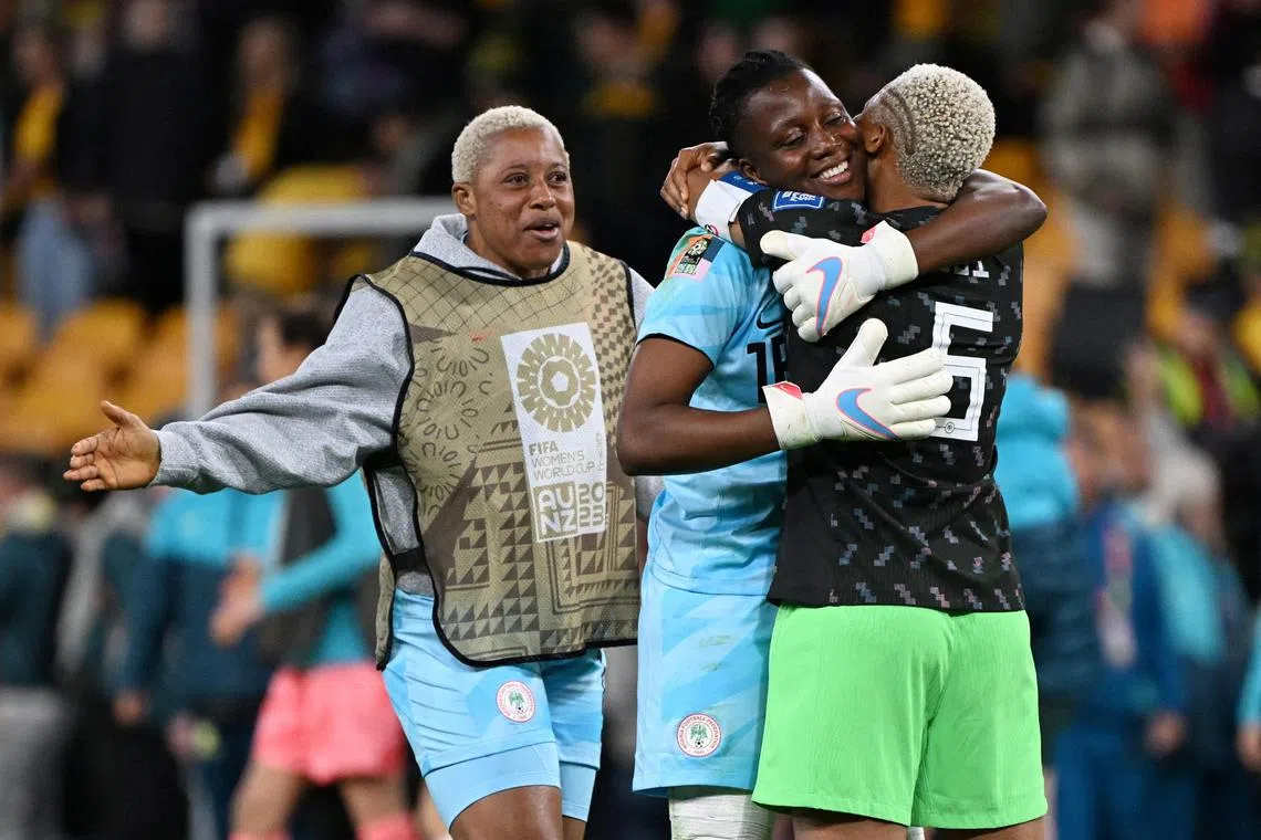 Nigeria's Chiamaka Nnadozie celebrates with Onome Ebi after the match against Australia.