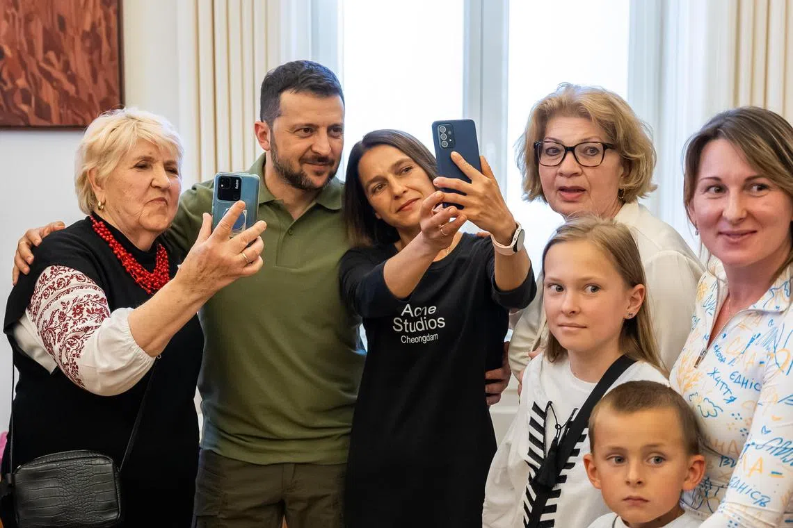President Volodymyr Zelensky meeting Ukrainians  in Lisbon, during a visit to Portugal on May 28.