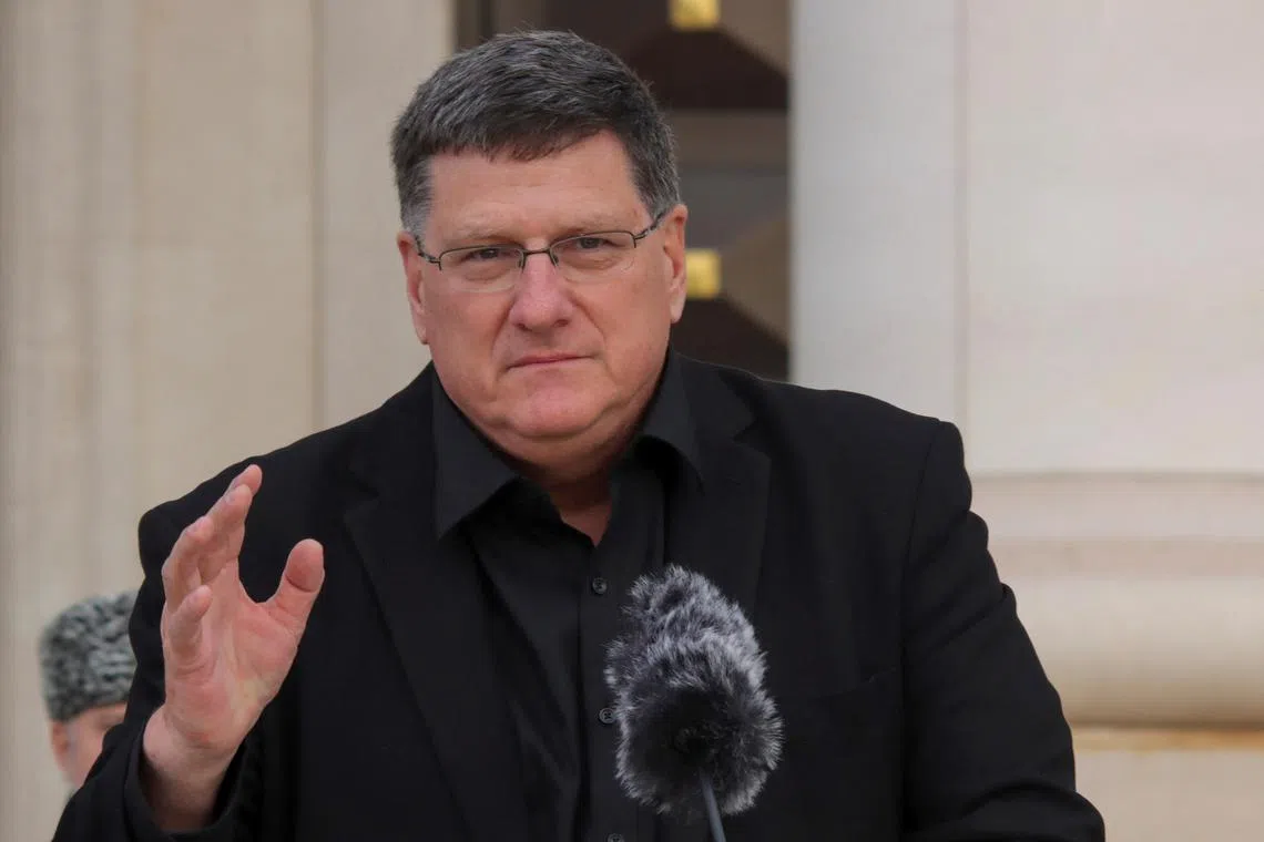 FILE PHOTO: U.S. military analyst Scott Ritter addresses service members of the Chechen special forces and military units within Russia's defence and security troops during a ceremony in Grozny, Russia, January 5, 2024. REUTERS/Chingis Kondarov/File Photo