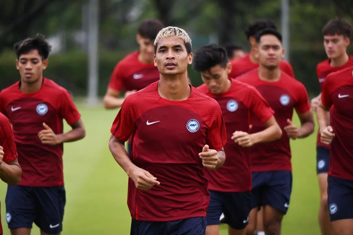 Singaporean footballer Safuwan Baharudin (centre), 32, will make his return to the national team in next Thursday's world cup qualifier against South Korea. He has not played for the national team since June 2022 as he had not received medical clearance following successive head injuries.

(ST PHOTO: AZMI ATHNI)