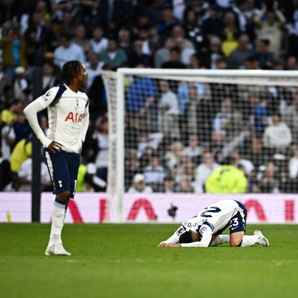 Tottenham Hotspur players looking dejected after an added-time equaliser sees Brighton & Hove Albion snatch a 2-2 English Premier League draw at the Tottenham Hotspur Stadium on April 18, 2026.
