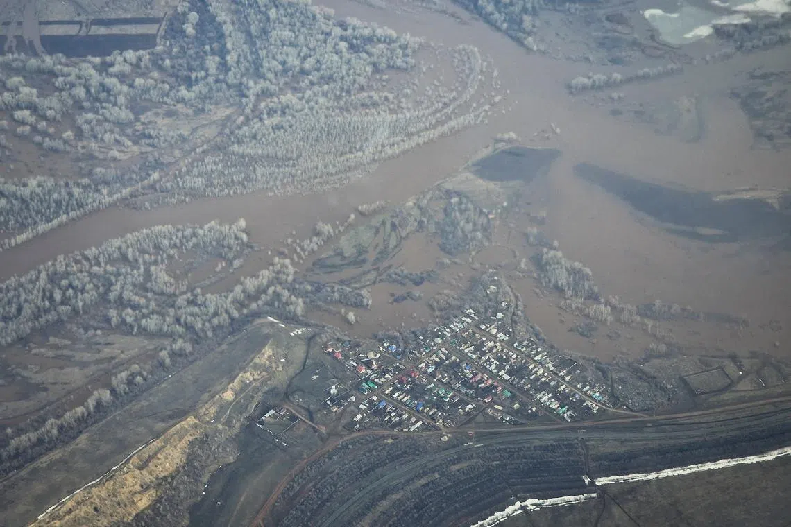An aerial picture taken from a plane shows a flooded area near the city of Orenburg, Russia April 10, 2024.  REUTERS/Maxim Shemetov/ File photo