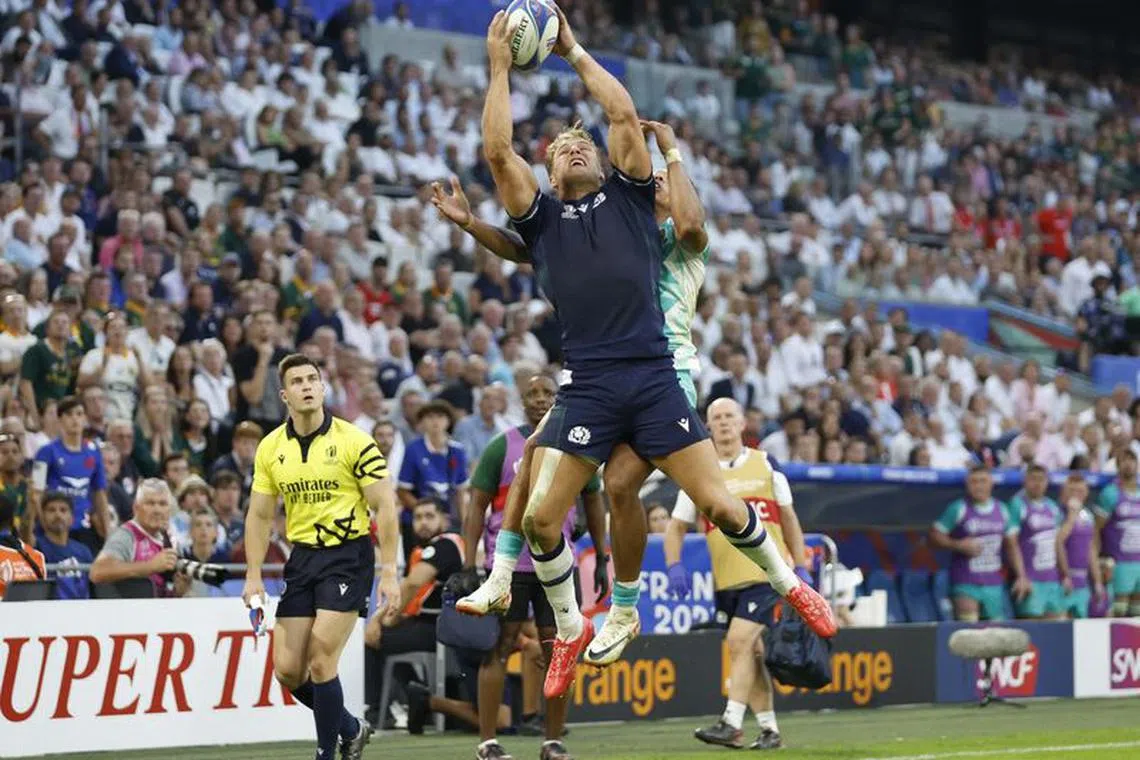 Rugby Union - Rugby World Cup 2023 - Pool B - South Africa v Scotland - Orange Velodrome, Marseille, France - September 10, 2023 Scotland's Duhan van der Merwe in action with South Africa's Kurt-Lee Arendse REUTERS/Peter Cziborra