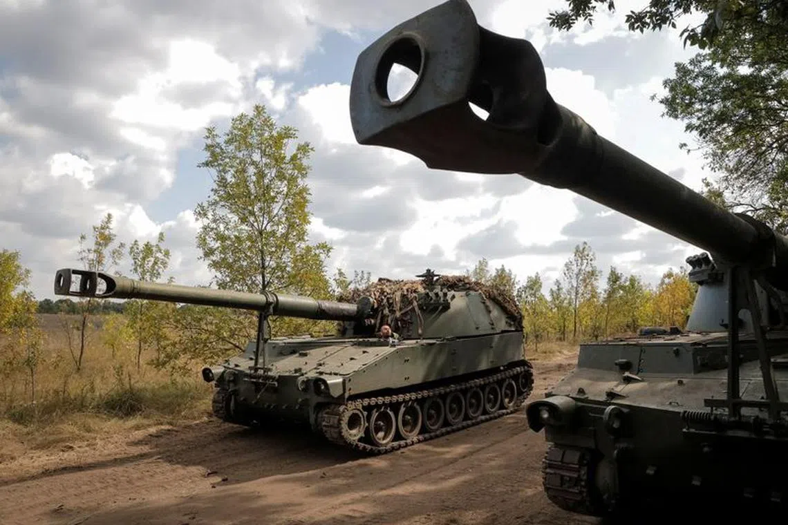FILE PHOTO: Ukrainian servicemen prepare to fire a M109 self-propelled howitzer towards Russian troops, amid Russia's attack on Ukraine, in Donetsk region, Ukraine September 11, 2023. REUTERS/Anna Voitenko