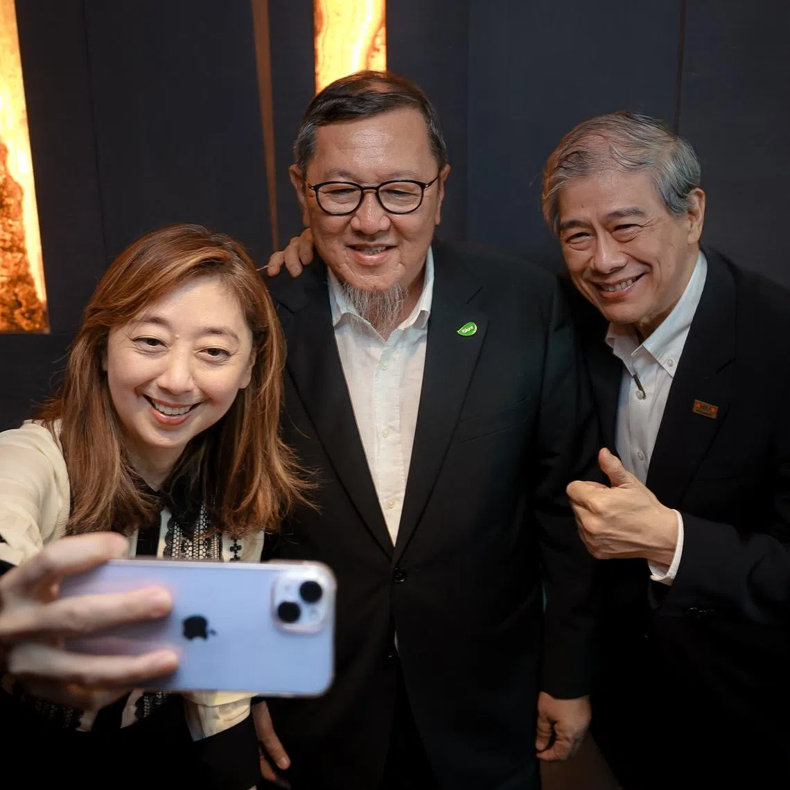 Malaysians Andrew Lim (right) and Gary Yap say economies of scale will improve pricing in Singapore and customers can see a greater variety of merchandise.