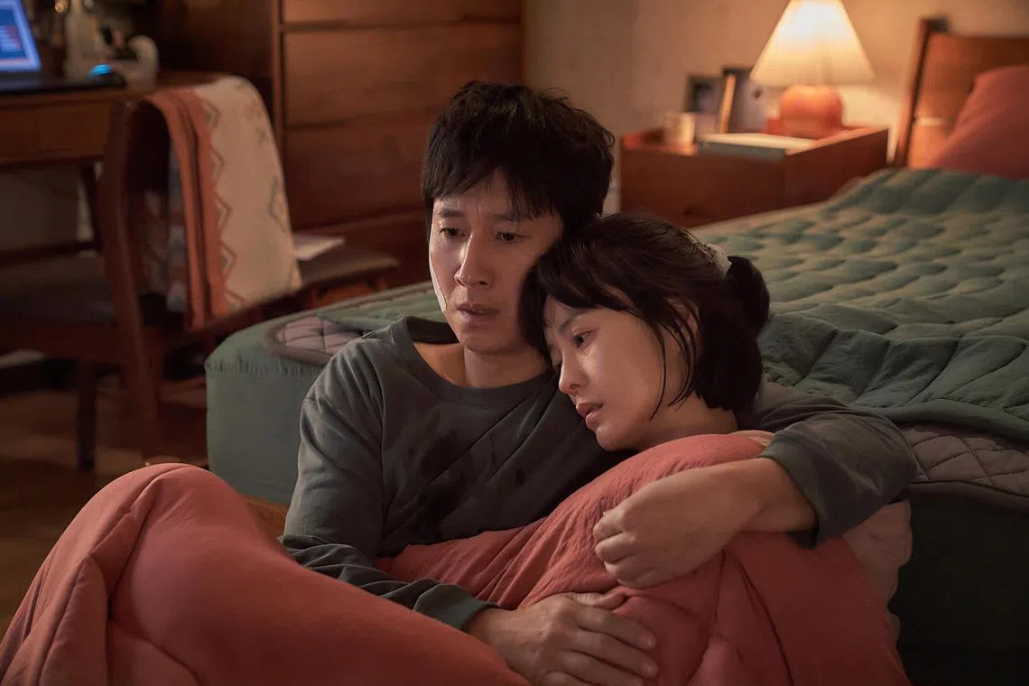 Horror comedy Sleep stars the late Lee Sun-kyun (left) and Jung Yu-mi as a husband and wife who discover odd events happening in their bedroom while both are asleep.