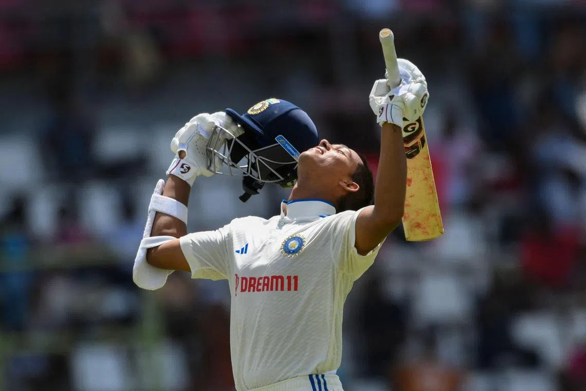 Yashasvi Jaiswal of India celebrates his century during day two of the First Test between West Indies and India at Windsor Park in Roseau, Dominica, on July 13, 2023. (Photo by Randy Brooks / AFP)