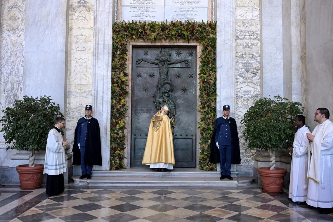 Cardinal Baldo Reina closing a Holy Door, as part of the end of the Catholic Jubilee Year, in Rome on Dec 27, 2025.