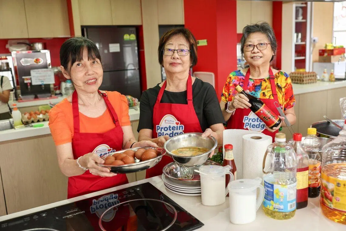 Seniors taking part in a hands-on cooking activity, using eggs to prepare nutritious dishes.
