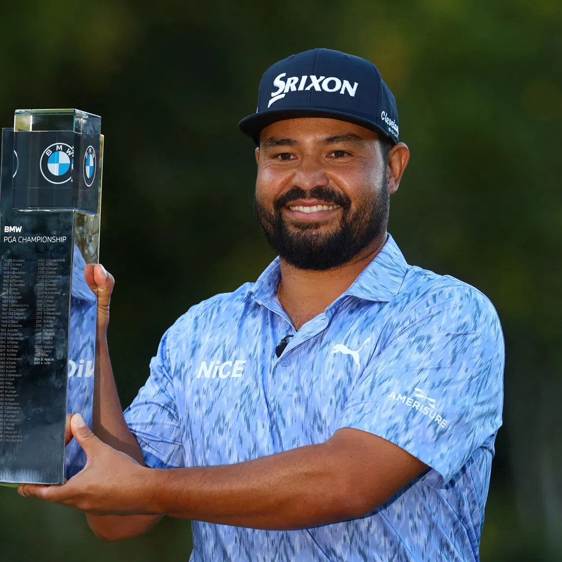 Golf - European Tour - BMW PGA Championship - Wentworth Club, Virginia Water, Britain - September 20, 2026 J.J. Spaun of the U.S. celebrates with the trophy after winning the BMW PGA Championship Action Images via Reuters/Matthew Childs