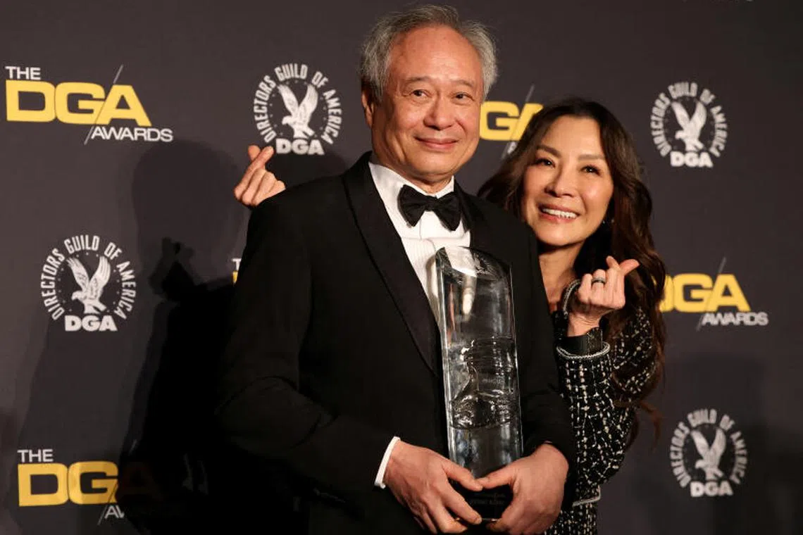 Taiwanese filmmaker Ang Lee poses with the Lifetime Achievement Award alongside actress Michelle Yeoh at the 77th Annual DGA (Directors Guild of America) Awards in Beverly Hills, California, U.S., February 8, 2025. REUTERS/Mario Anzuoni TPX IMAGES OF THE DAY

