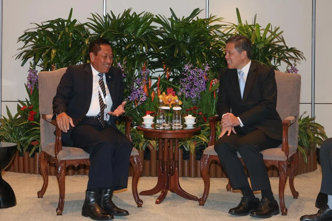 Defence Minister Chan Chun Sing (right) with Indonesian Vice-Minister of Defence Donny Ermawan Taufanto on the sidelines of the Shangri-La Dialogue on May 29.