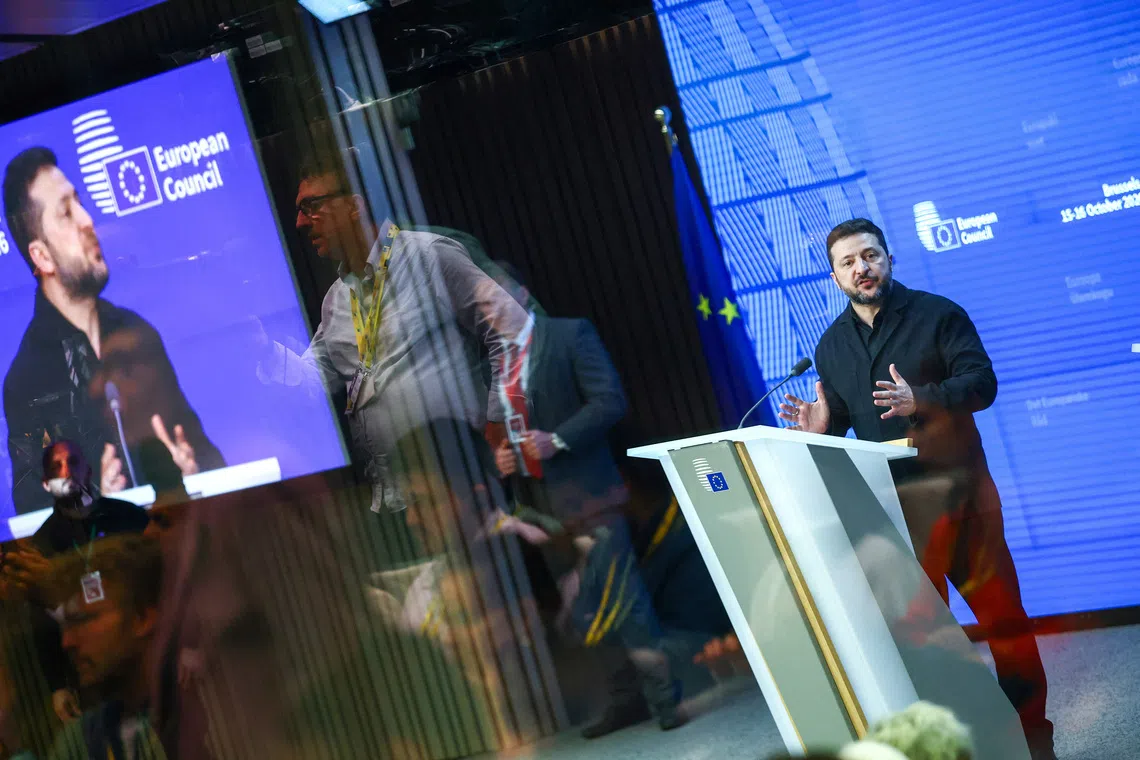Ukrainian President Volodymyr Zelenskiy speaks during a press conference at a European Union leaders' summit in Brussels, Belgium, October 16, 2026. REUTERS/Yves Herman