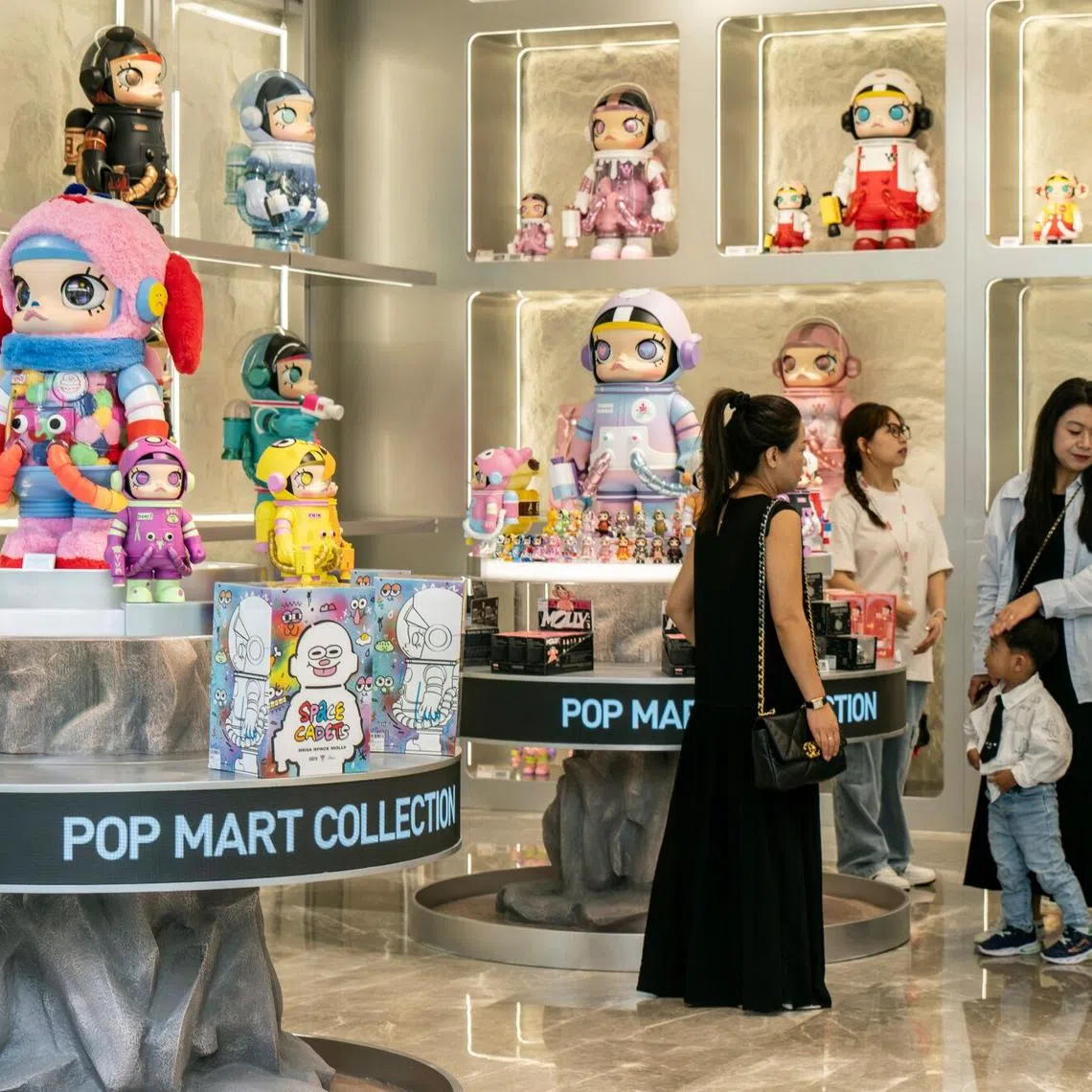 Pop Mart's clientele has shifted from young adults to well-to-do working moms who like to dangle Labubu keychains on their oversized “Big Ass Bag,” a trendy look this year.
