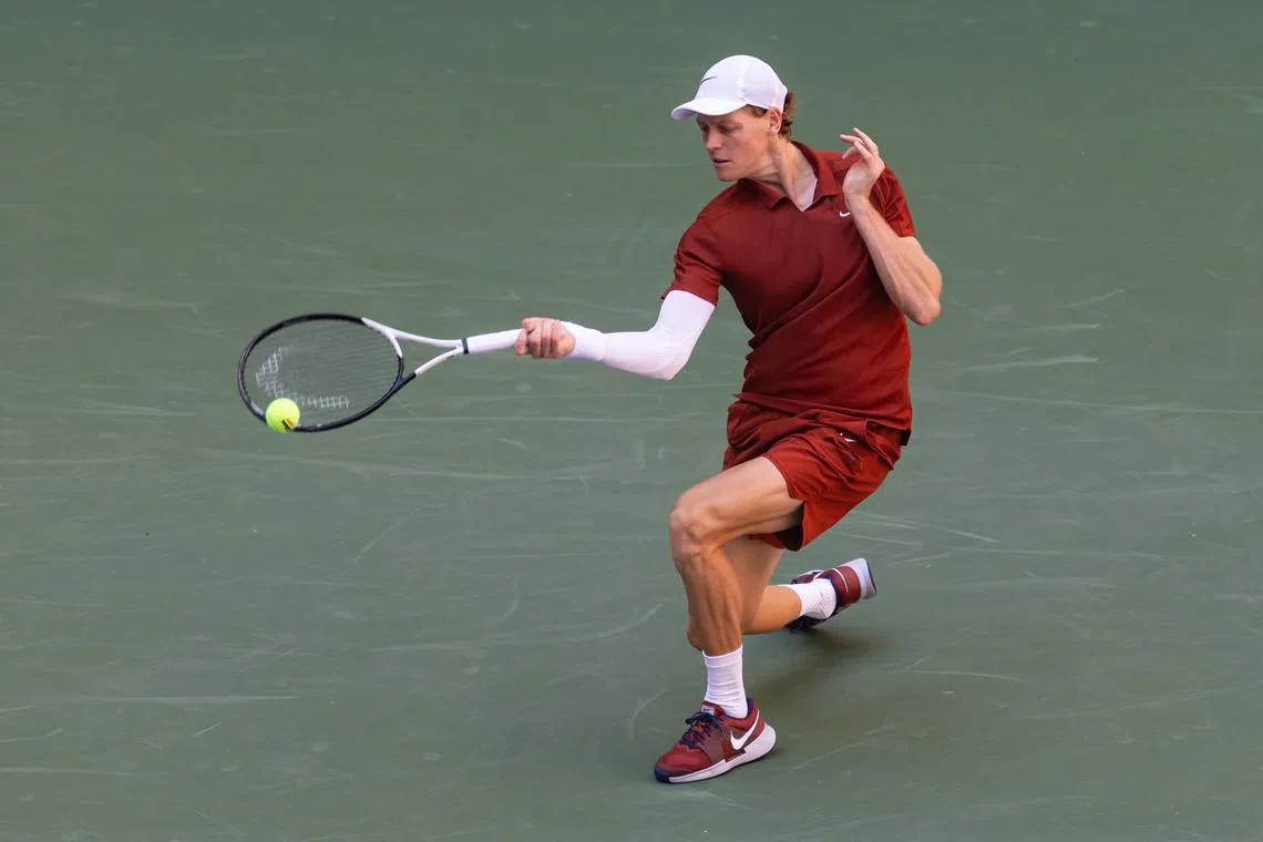 Aug 30, 2025; Flushing, NY, USA; Jannik Sinner of Italy in action against Denis Shapovalov of Canada in the third round of the men's singles at the US Open at Arthur Ashe Stadium in Billie Jean King National Tennis Center. Mandatory Credit: Mike Frey-Imagn Images
