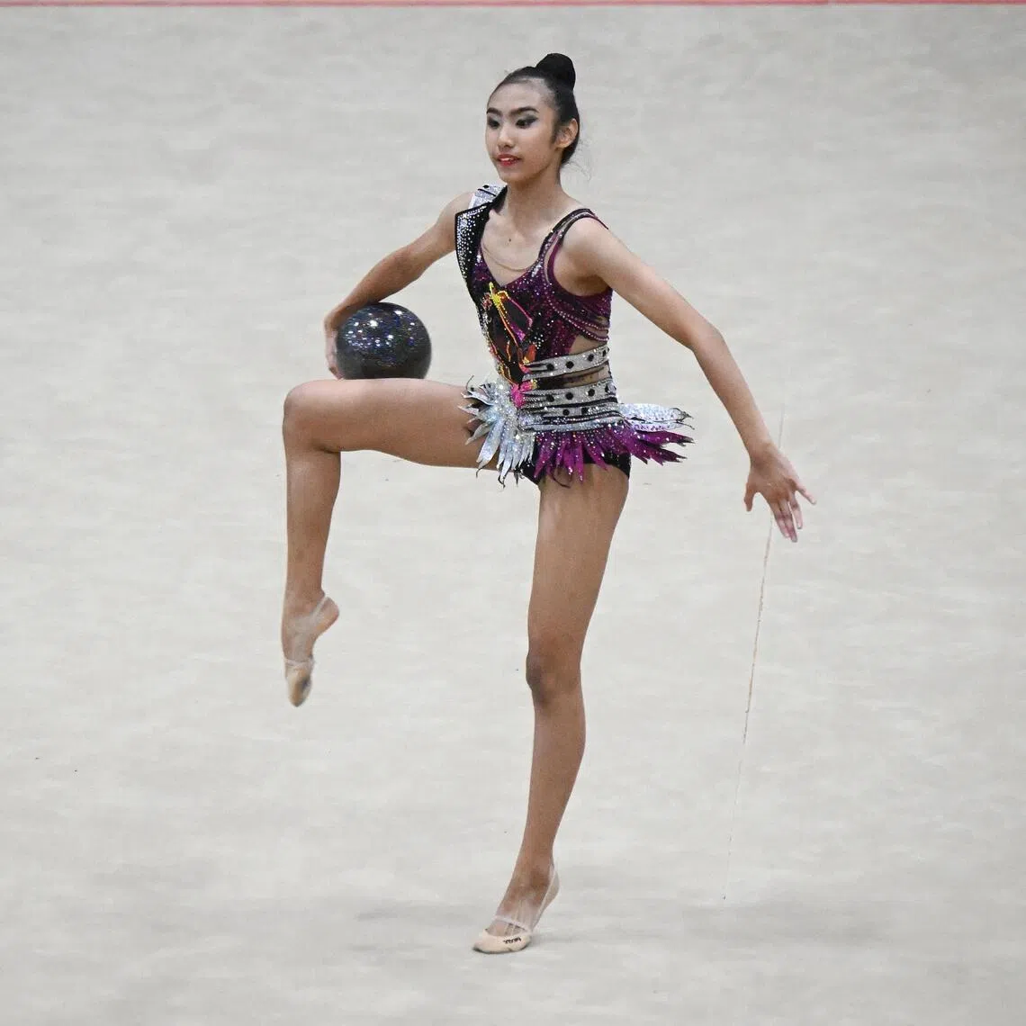 Avery Tan during the NSG B Division Girl's Rhythmic Gymnastics Ball event held on April 16 at Bishan Sports Hall.