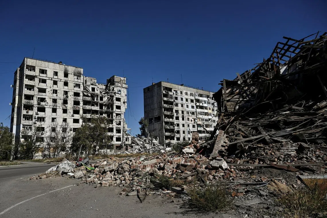 FILE PHOTO: A view shows apartment buildings damaged by Russian military strikes in the town of Orikhiv, amid Russia's attack on Ukraine, near a front line in Zaporizhzhia region, Ukraine October 9, 2024. REUTERS/Stringer/File Photo