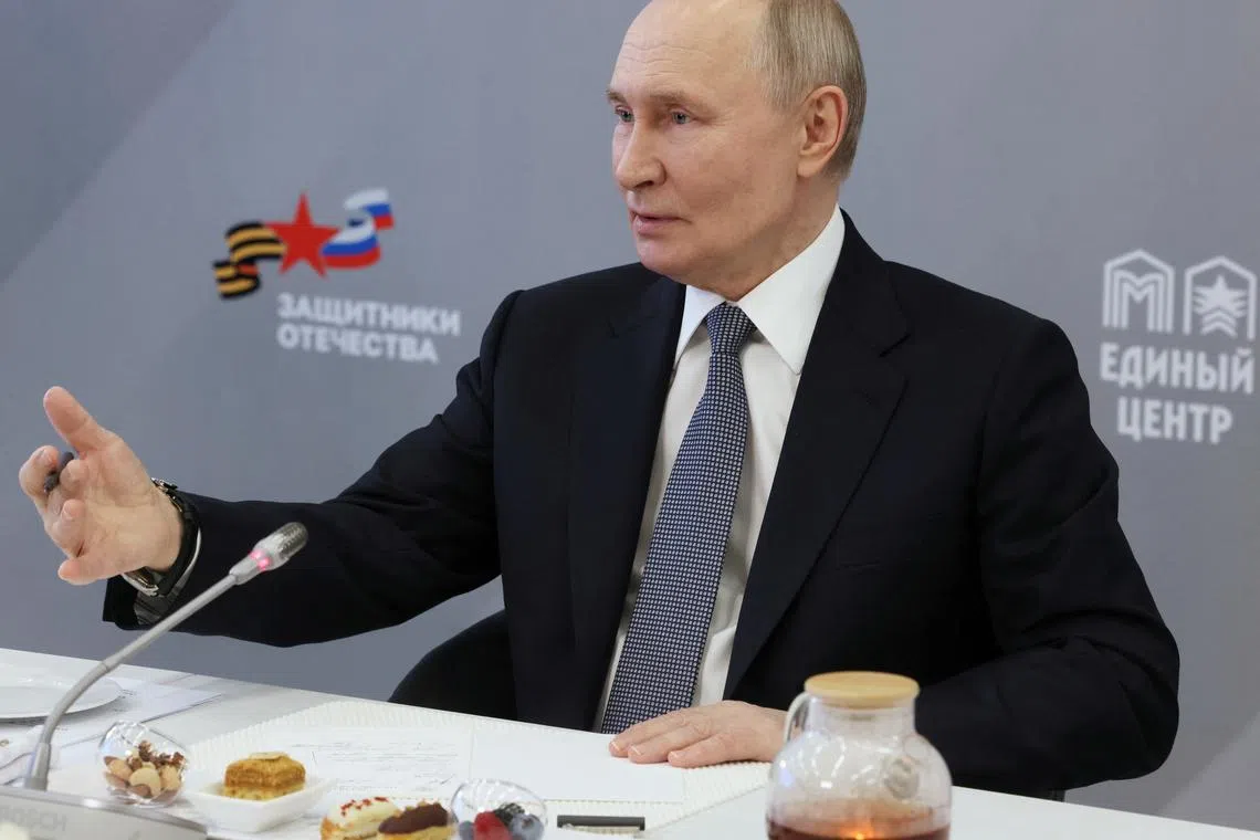 Russian President Vladimir Putin meets with employees and wards of the Defenders of the Fatherland state fund supporting Russian service members involved in Russia-Ukraine conflict and their families, in Moscow, Russia March 6, 2025. Sputnik/Mikhail Metzel/Pool via REUTERS