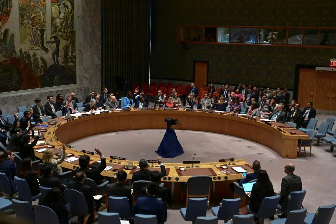 Members of the UN Security Council vote on a US-drafted resolution for a ceasefire between Israel and Palestinian militants Hamas in the Gaza Strip, on June 10.