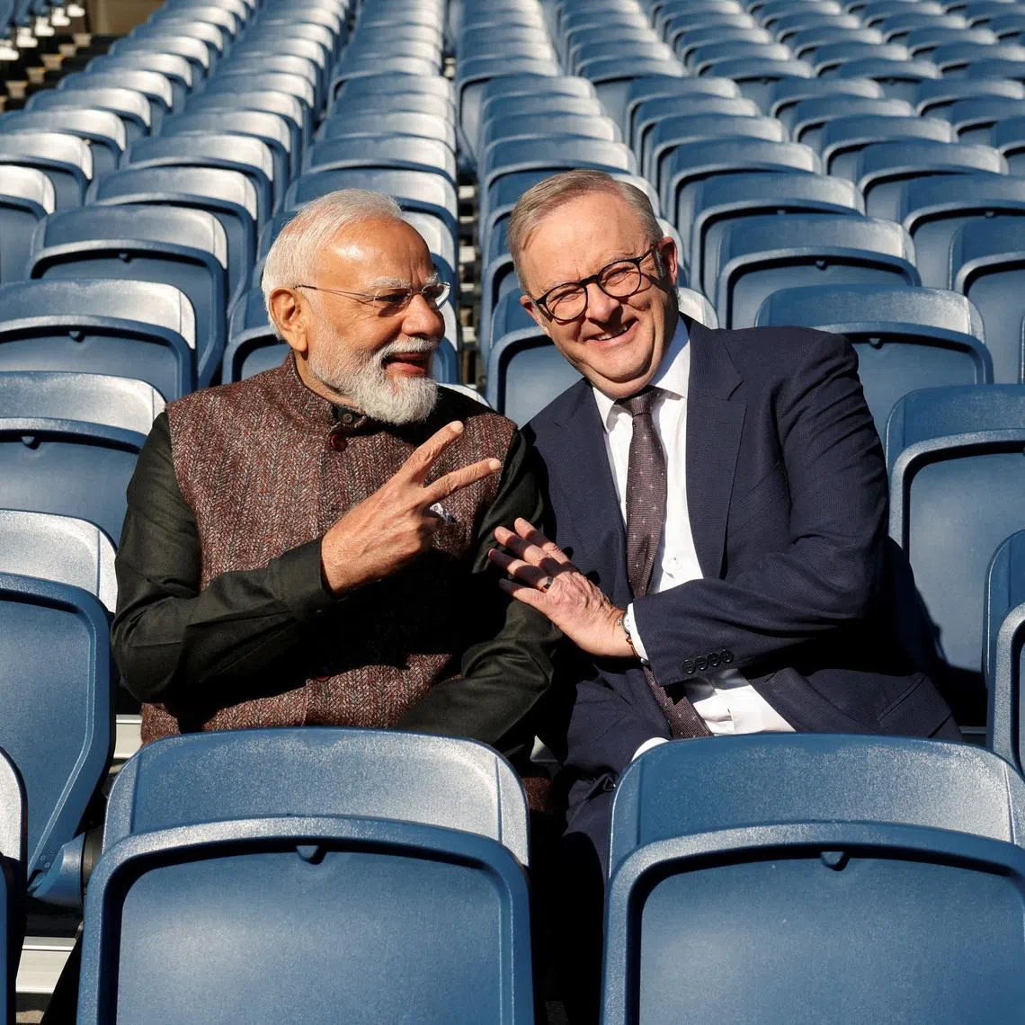 Australian Prime Minister Anthony Albanese and Indian Prime Minister Narendra Modi pose for a picture in the stands at the Melbourne Cricket Ground (MCG) in Melbourne, Australia, July 10, 2026. REUTERS/Hollie Adams