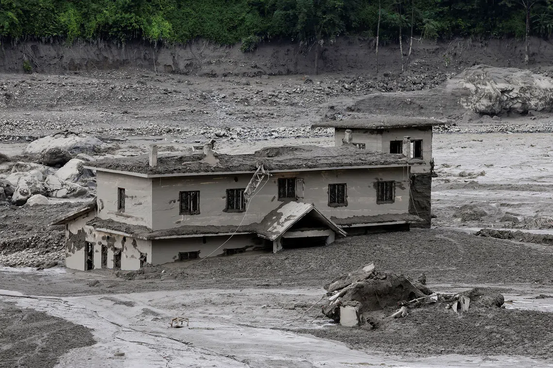 A mud-covered building following a flash flood at Trishuli in Nuwakot district, Nepal, August 26, 2026. REUTERS/Navesh Chitrakar