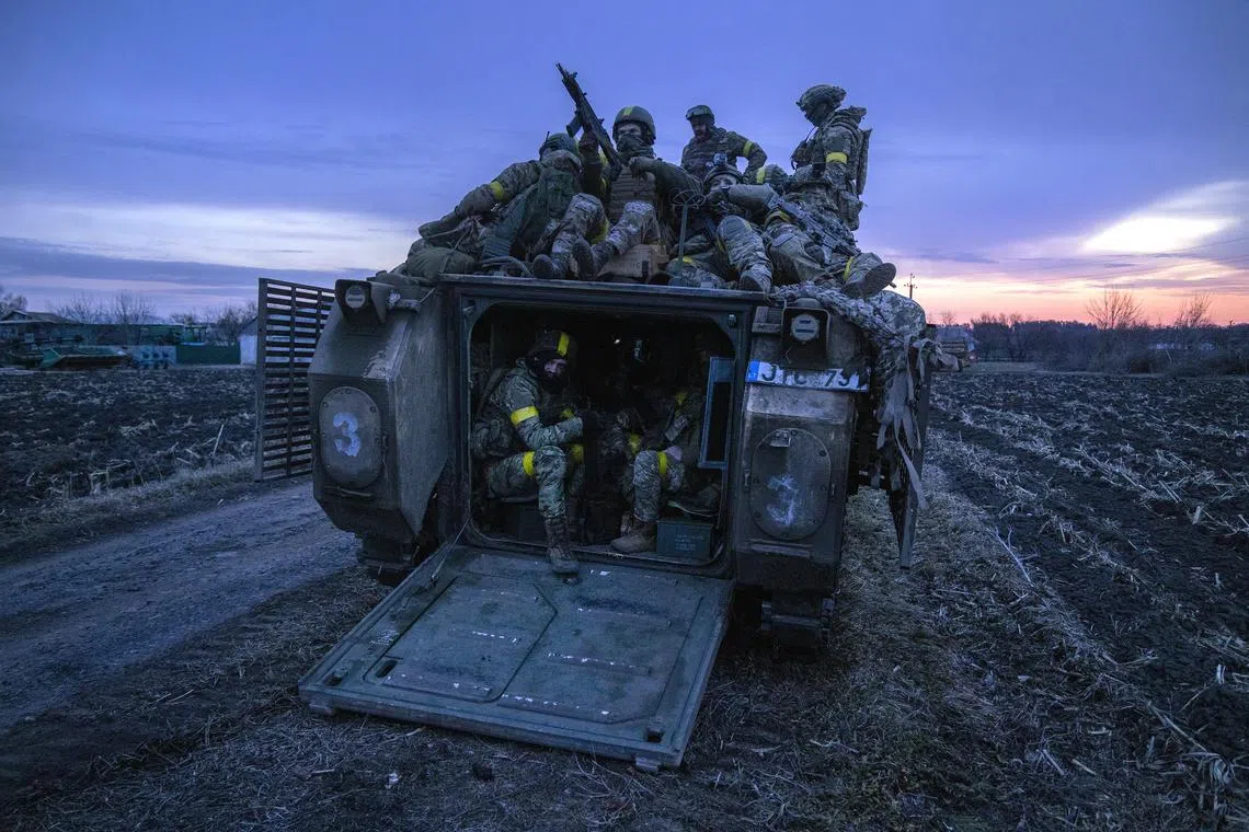 Ukrainian soldiers near the Russian border in the Sumy region of Ukraine on March 14. The Ukrainian borderland has long been a place where cultures merge now it is again a place of combat. 