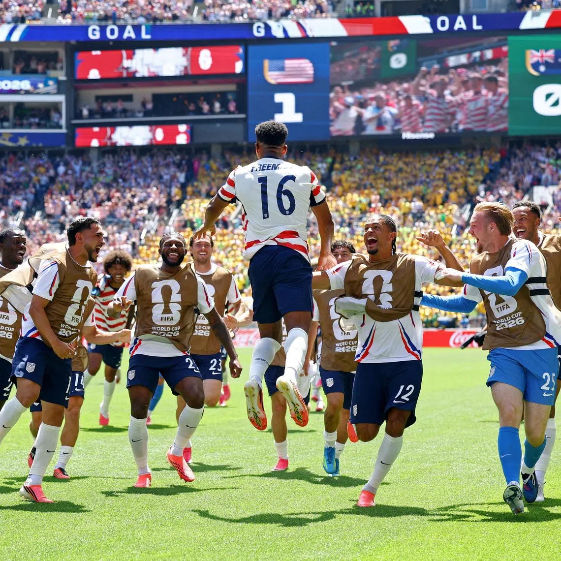 Soccer Football - FIFA World Cup 2026 - Group D - United States v Australia - Seattle Stadium, Seattle, Washington, U.S. - June 19, 2026 Alex Freeman of the U.S. celebrates scoring their second goal with teammates REUTERS/Albert Gea