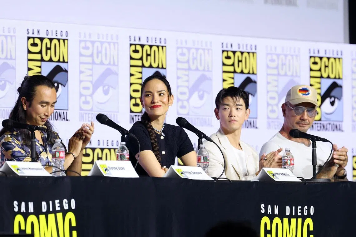 The voice cast includes Roman Zaragoza (left) as Sokka, Jessica Matten as Katara, Eric Nam as Aang and Dave Bautista (right) as the villain Tagah.
